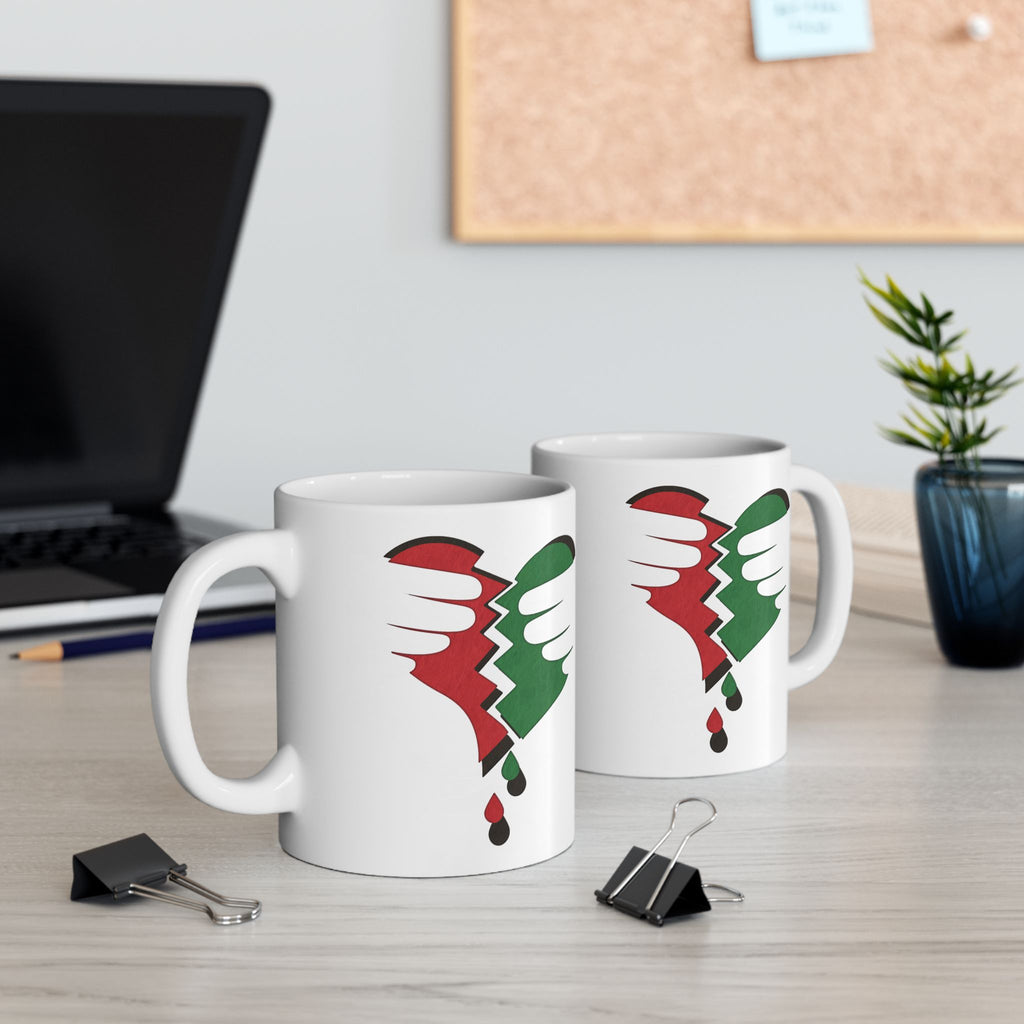 Three glossy white Broken Heart Palestine ceramic mugs with red-green broken-heart motif (11oz/15oz).