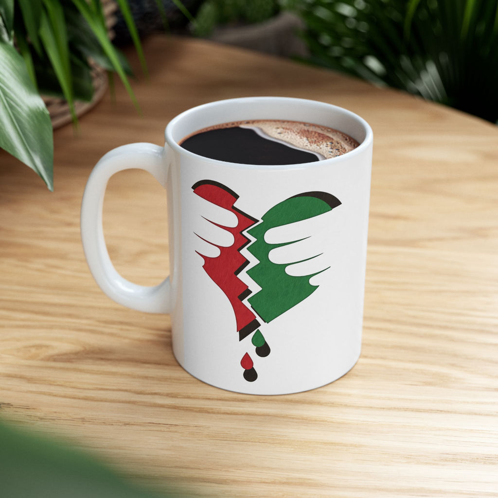 Glossy Broken Heart Palestine ceramic mug (11oz/15oz) with a vivid shattered-heart design.